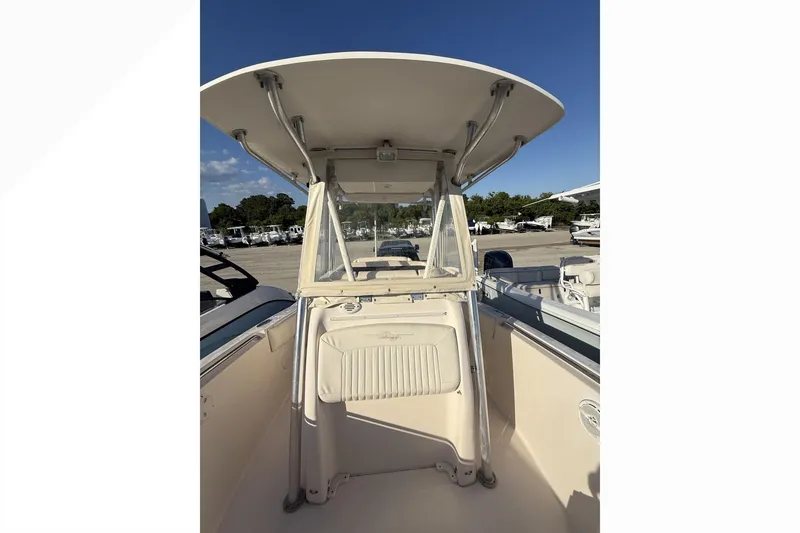 Slide: The Image of 2011 Grady-White Fisherman 230 boat interior with T-top and console view. - 4