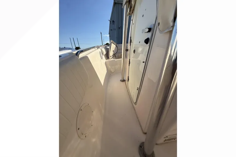 Slide: The Image of 2011 Grady-White Fisherman 230 boat interior, showcasing sleek design and spacious layout. - 7