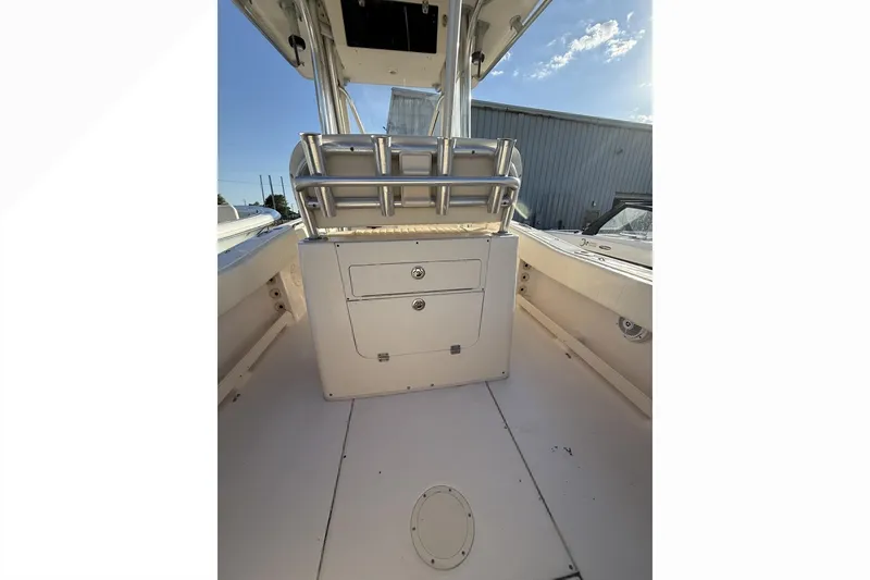 Slide: The Image of 2011 Grady-White Fisherman 230 boat interior with storage compartments and seating. - 8