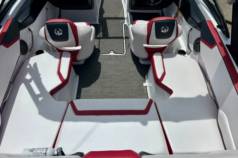 Slide: The Image of Interior of 2021 Scarab 195 ID boat with red and white seating. - 18