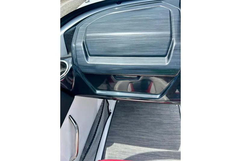 Slide: The Image of 2021 Scarab 195 ID boat interior with sleek dashboard design and modern finishes. - 20