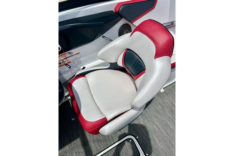 Slide: The Image of Red and white seat in 2021 Scarab 195 ID boat interior. - 24