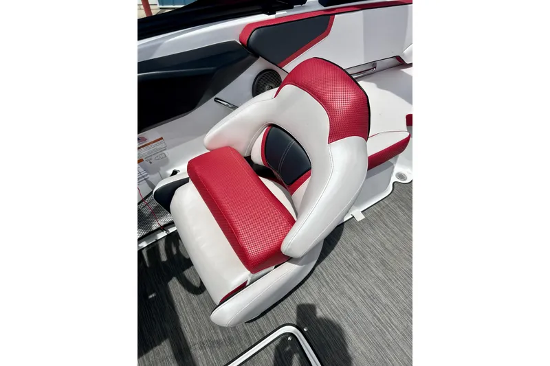 Slide: The Image of Red and white seat in 2021 Scarab 195 ID boat interior. - 25