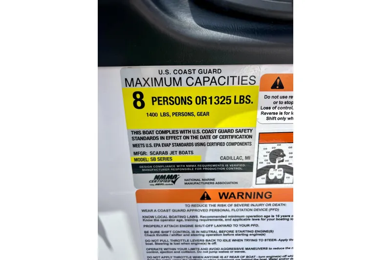 Slide: The Image of Scarab 195 ID 2021 boat capacity label, 8 persons or 1325 lbs, safety warnings included. - 26