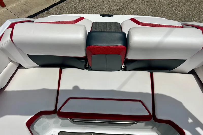 Slide: The Image of 2021 Scarab 195 ID boat interior with red, white, and black seating design. - 37