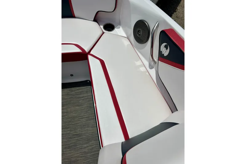 Slide: The Image of 2021 Scarab 195 ID boat interior with red and white seating and speaker detail. - 43