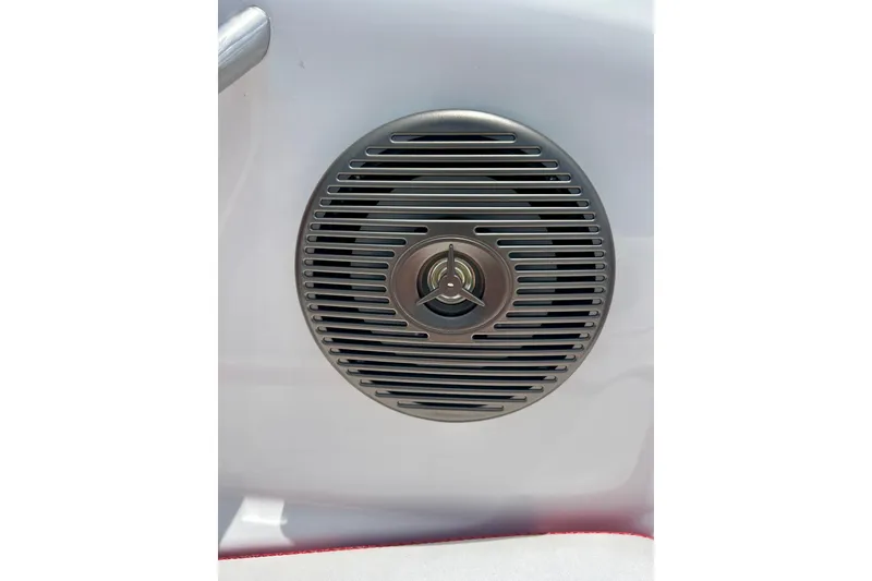 Slide: The Image of Speaker grille on 2021 Scarab 195 ID boat, featuring sleek metallic design. - 45