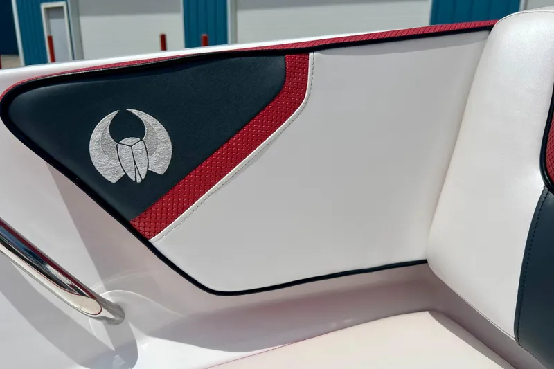 Slide: The Image of Interior detail of 2021 Scarab 195 ID boat with red and black accents. - 48