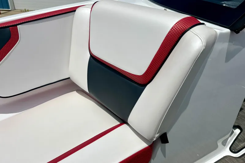 Slide: The Image of 2021 Scarab 195 ID boat seat with red, white, and black upholstery design. - 49