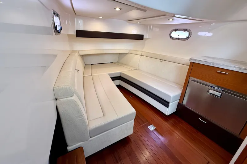 Slide: The Image of Luxurious interior of 2018 Pursuit S 408 Sport boat with plush seating and modern amenities. - 78