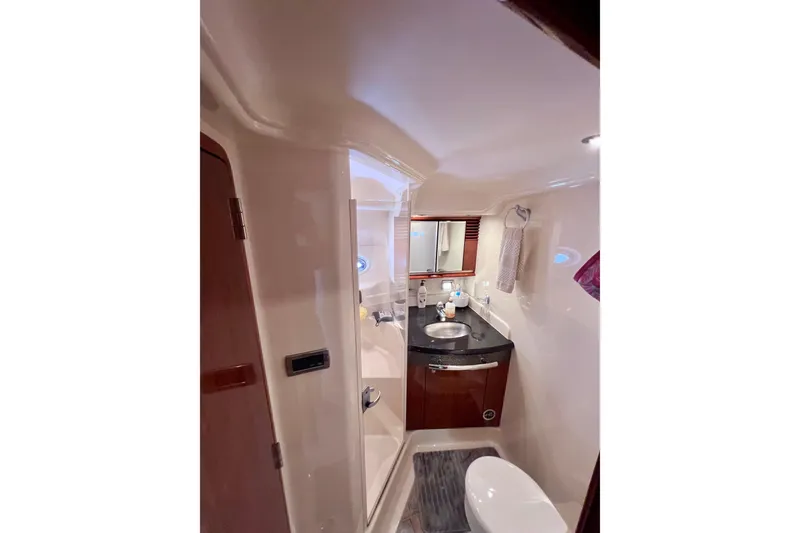 Slide: The Image of Luxurious bathroom interior of 2004 Sea Ray 500 Sundancer yacht, featuring modern amenities. - 31