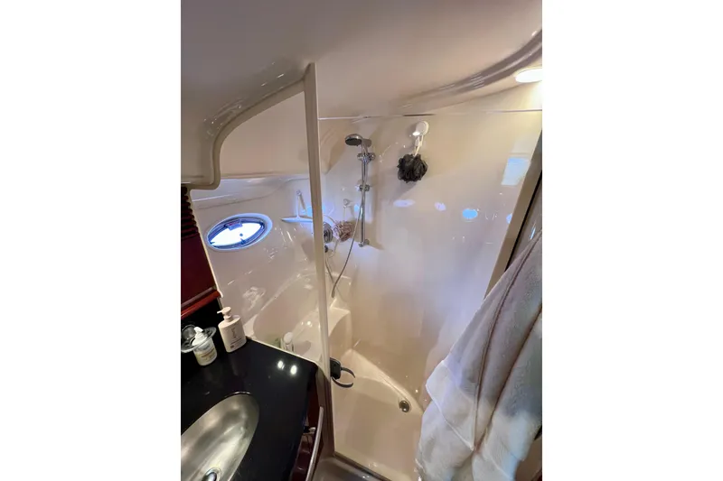 Slide: The Image of Luxurious bathroom in 2004 Sea Ray 500 Sundancer yacht with modern fixtures and elegant design. - 35