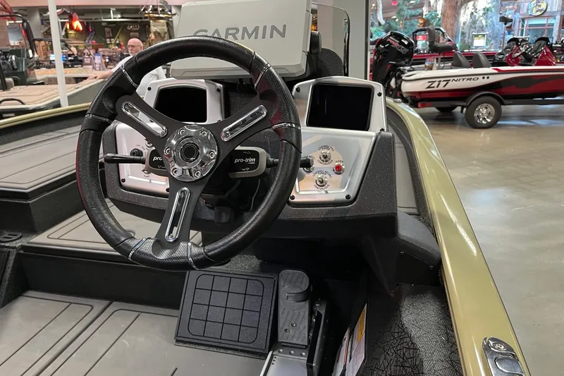 Slide: The Image of Steering console of 2026 Tracker Savage 215 boat with Garmin navigation system. - 6