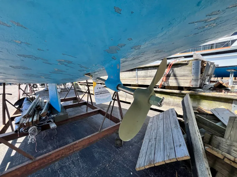 Slide: The Image of Propeller of a 1974 Capital Newport 30 MKII sailboat in dry dock. - 3