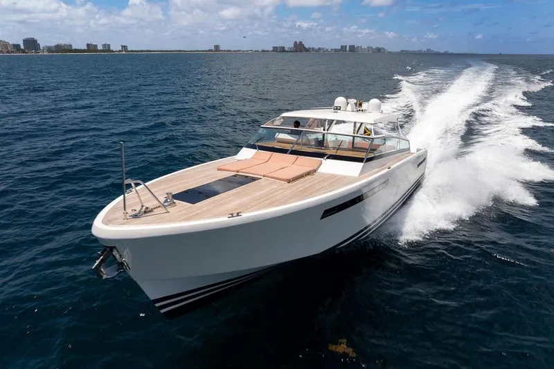Slide: The Image of 2023 Delta Powerboats 60 Open cruising on open water, showcasing sleek design and speed. - 21