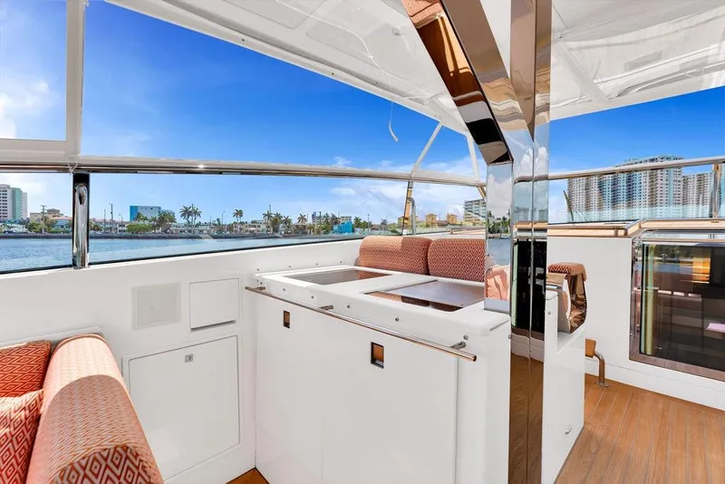 Slide: The Image of Luxurious 2023 Delta Powerboats 60 Open yacht interior with waterfront view. - 28