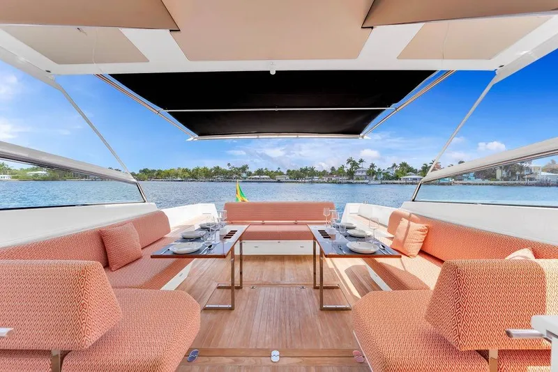 Slide: The Image of Luxurious 2023 Delta Powerboats 60 Open yacht interior with elegant seating and ocean view. - 32