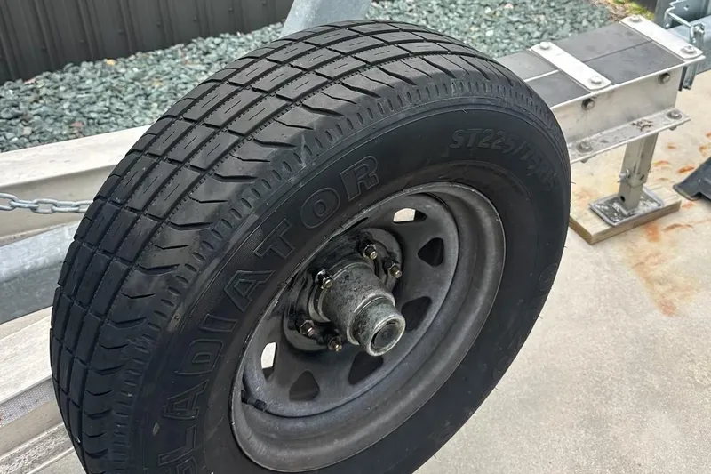 Slide: The Image of Trailer tire for 2019 Sea Hunt Gamefish 25, featuring Gladiator ST225/75R15. - 17