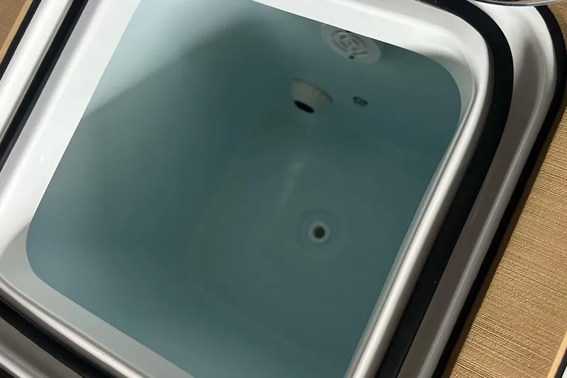 Slide: The Image of Livewell compartment of a 2019 Sea Hunt Gamefish 25 boat. - 7