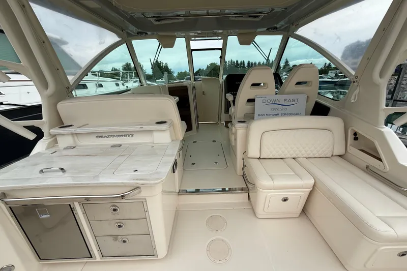 Slide: The Image of Interior of 2025 Grady-White Freedom 345 boat, featuring luxurious seating and modern amenities. - 15