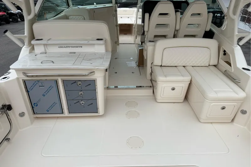 Slide: The Image of 2025 Grady-White Freedom 345 boat interior with seating and storage compartments. - 25