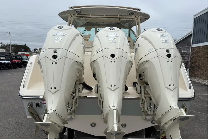 Slide: The Image of 2025 Grady-White Freedom 345 boat with triple Yamaha 350 V6 outboard engines. - 32