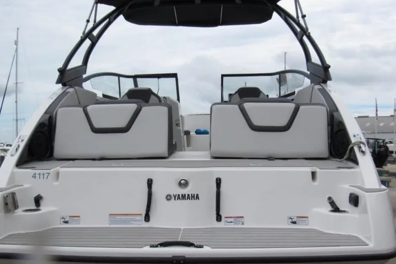 Slide: The Image of 2024 Yamaha Boats AR250 rear view with seating and sleek design. - 4
