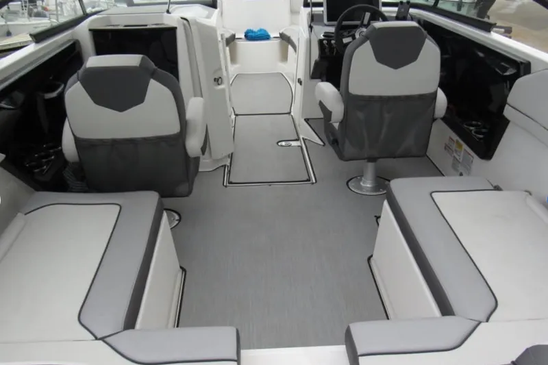 Slide: The Image of 2024 Yamaha Boats AR250 interior with modern seating and sleek design. - 5