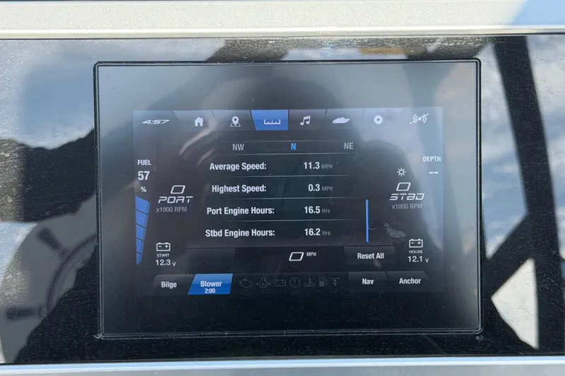 Slide: The Image of 2024 Yamaha Boats AR250 dashboard display showing speed, engine hours, and fuel level. - 14