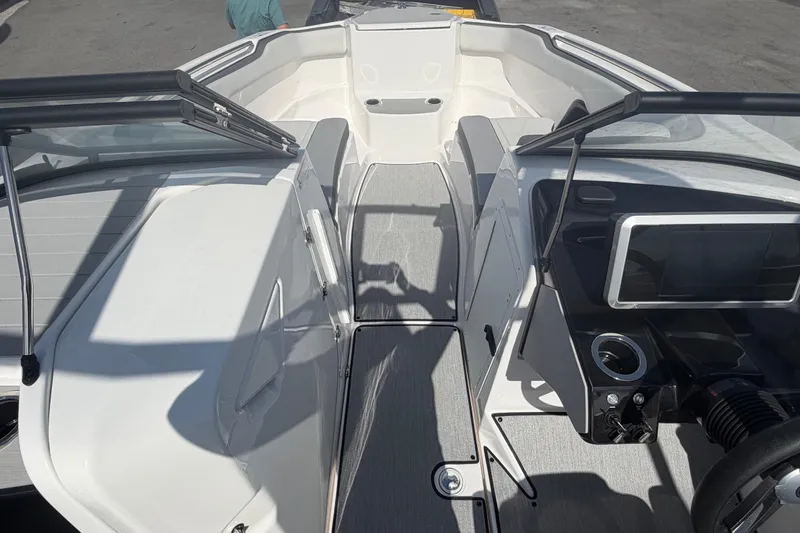 Slide: The Image of 2024 Yamaha Boats AR250 interior with sleek design and modern dashboard features. - 16