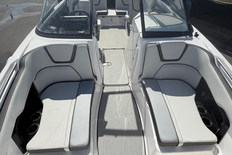 Slide: The Image of 2024 Yamaha Boats AR250 interior with sleek seating and modern design. - 19