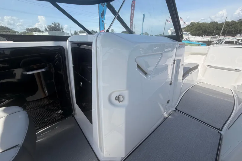 Slide: The Image of 2025 Yamaha Boats AR250 interior with sleek design and modern features. - 29