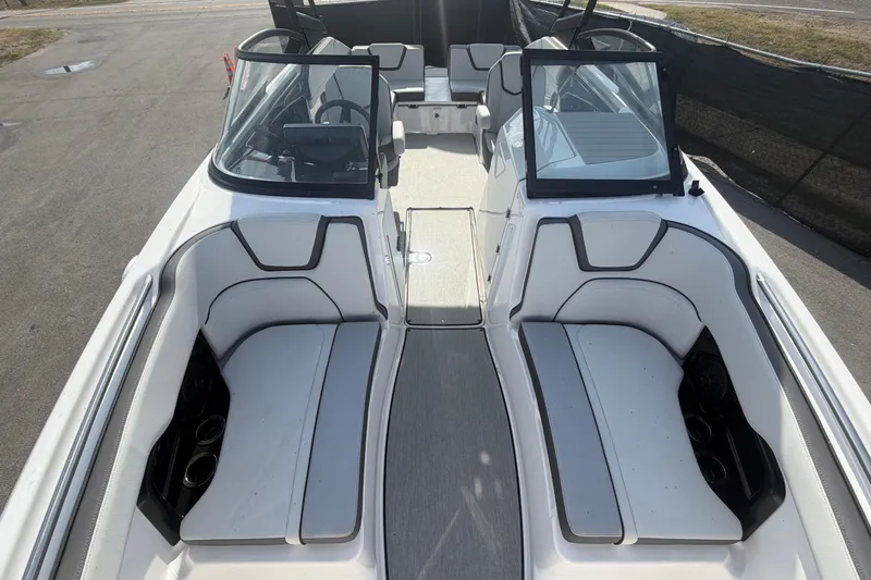 Slide: The Image of 2025 Yamaha Boats AR250 interior with sleek seating and modern design. - 40