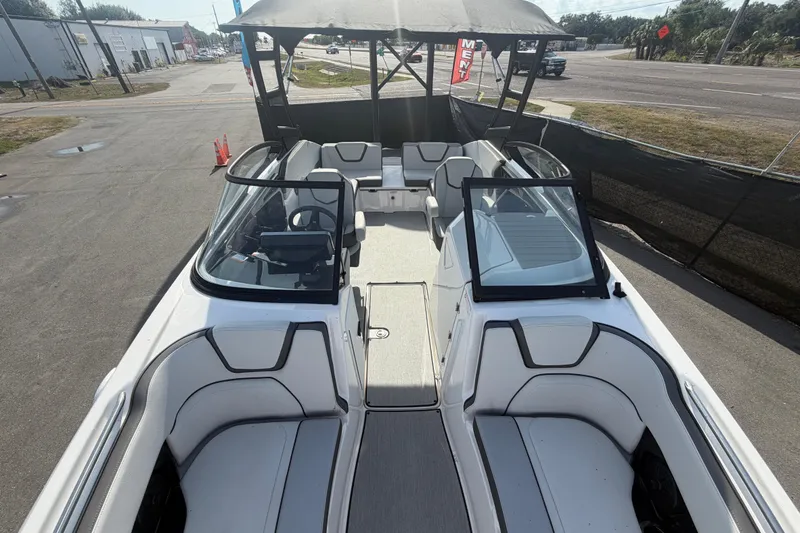 Slide: The Image of 2025 Yamaha Boats AR250 interior view, showcasing sleek seating and modern design. - 41