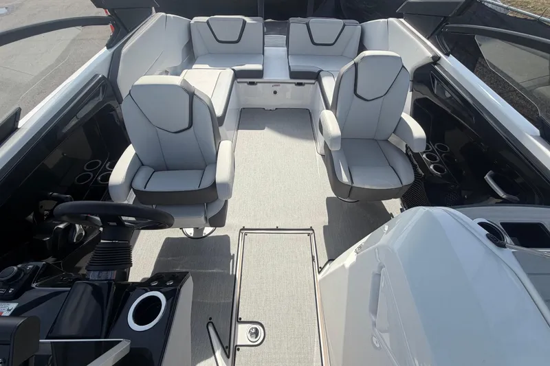 Slide: The Image of 2025 Yamaha Boats AR250 interior with modern seating and sleek design. - 43