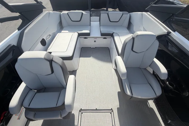 Slide: The Image of 2025 Yamaha Boats AR250 interior with modern seating and sleek design. - 44