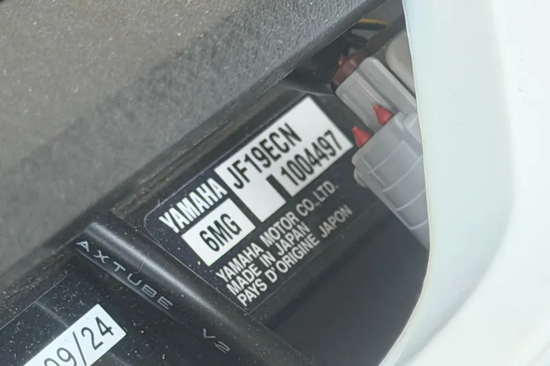 Slide: The Image of Label on 2025 Yamaha Boats AR250 engine, showing model and manufacturing details. - 61