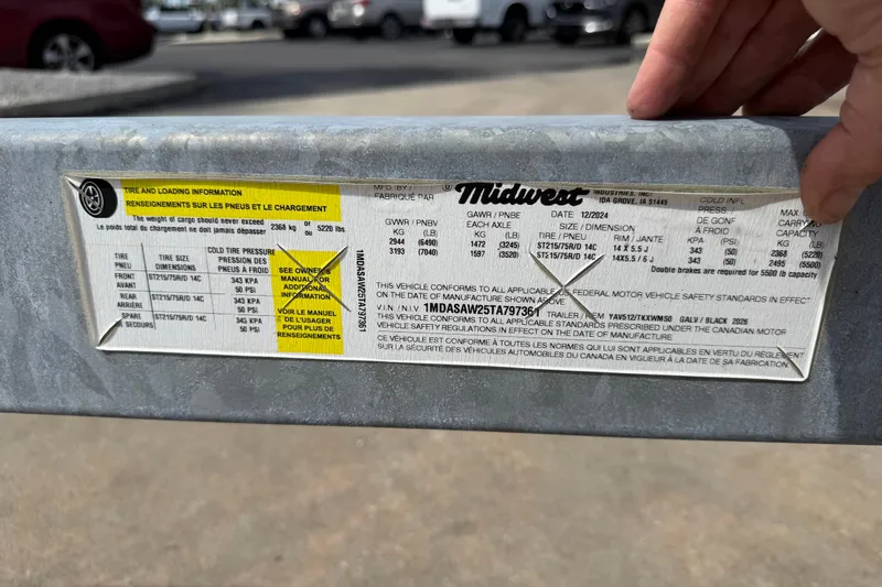 Slide: The Image of Sticker displaying tire and loading information for a 2025 Yamaha Boats AR250 trailer. - 62