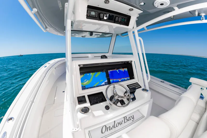 Slide: The Image of Onslow Bay 41 boat 2023 on open sea, modern cockpit design. - 12