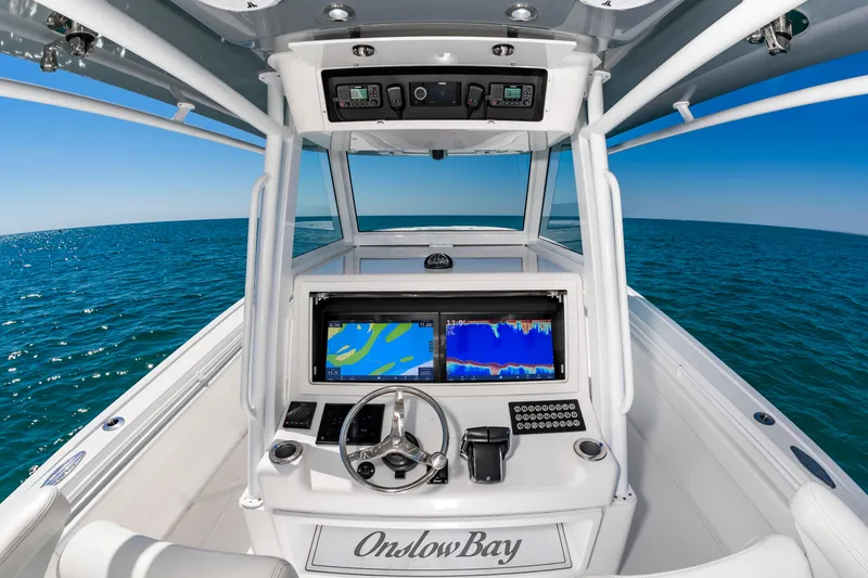 Slide: The Image of Onslow Bay 41 boat 2023 on open sea, modern cockpit design. - 13