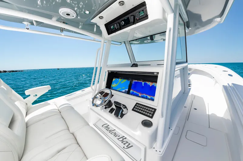 Slide: The Image of Onslow Bay 41 boat 2023 on open sea, modern cockpit design. - 14