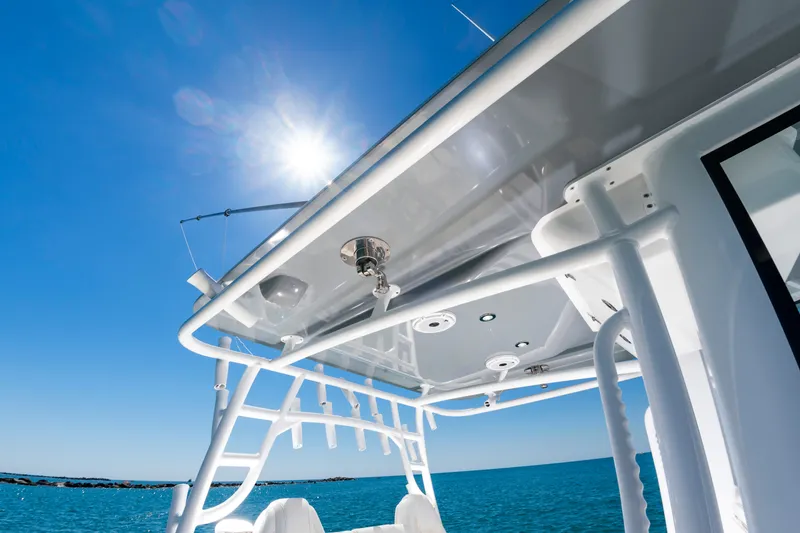 Slide: The Image of Onslow Bay 41 boat on the ocean under bright sun. - 17