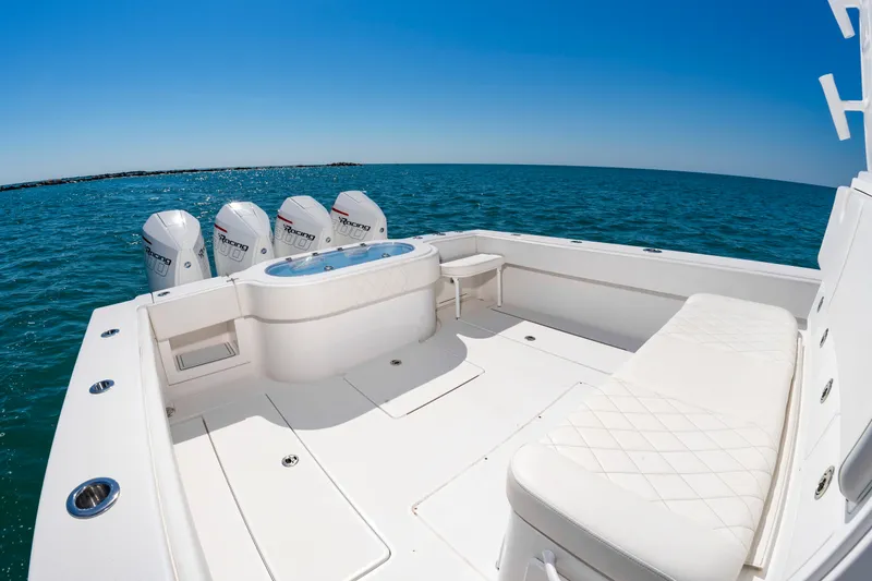Slide: The Image of Onslow Bay 41 boat 2023 on open sea with four engines. - 19