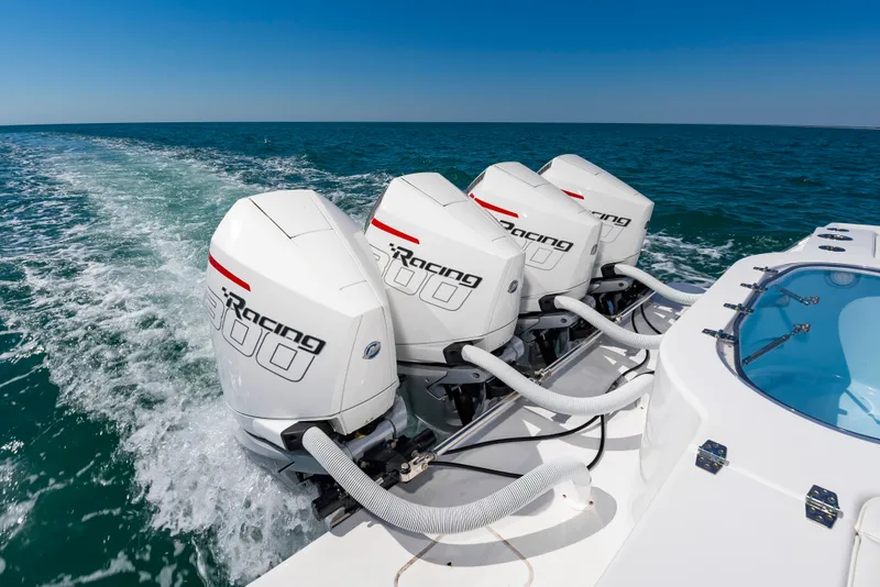 Slide: The Image of Onslow Bay 41 boat with four outboard engines on the sea, 2023 model. - 22