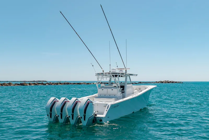 Slide: The Image of Onslow Bay 41 boat 2023 on water with four engines. - 3