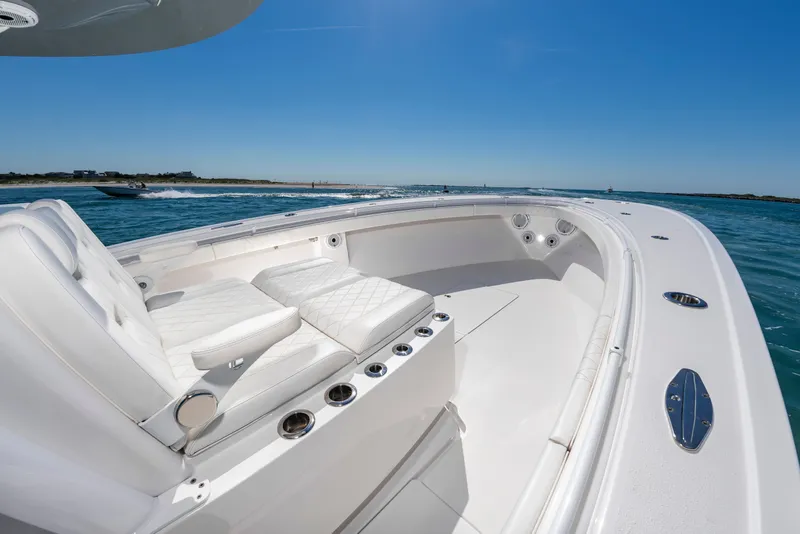 Slide: The Image of Onslow Bay 41 boat 2023 on the water under sunny skies. - 31
