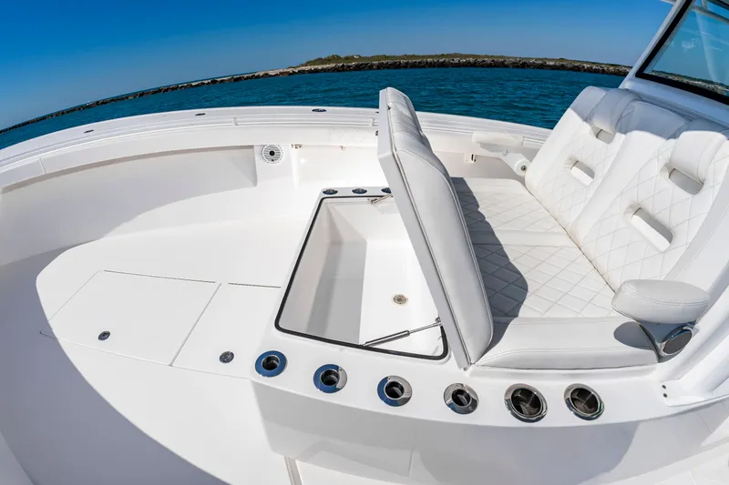Slide: The Image of Onslow Bay 41 boat 2023 with luxurious white seating area. - 33