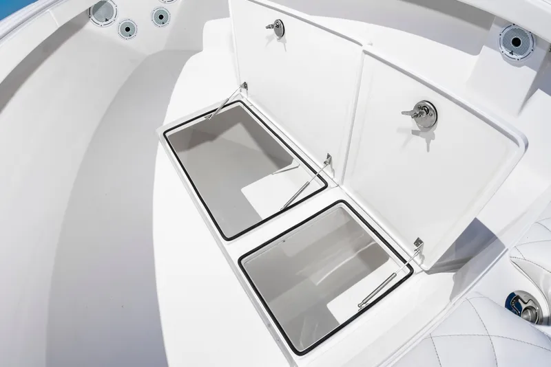 Slide: The Image of 2023 Onslow Bay 41 boat with open storage compartments. - 36