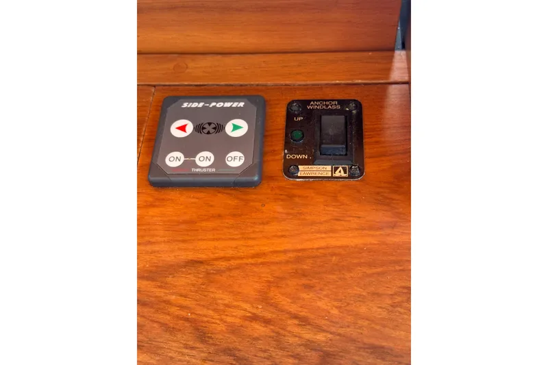 Slide: The Image of Control panel for Side-Power thruster and anchor windlass on 1998 Pacific Seacraft Pilothouse 32. - 27