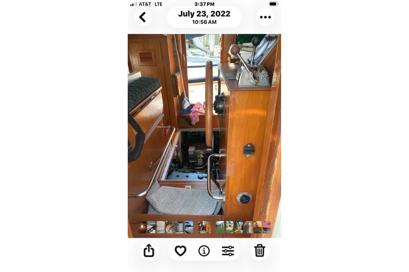 Slide: The Image of Interior view of 1998 Pacific Seacraft Pilothouse 32, showcasing helm and controls. - 33